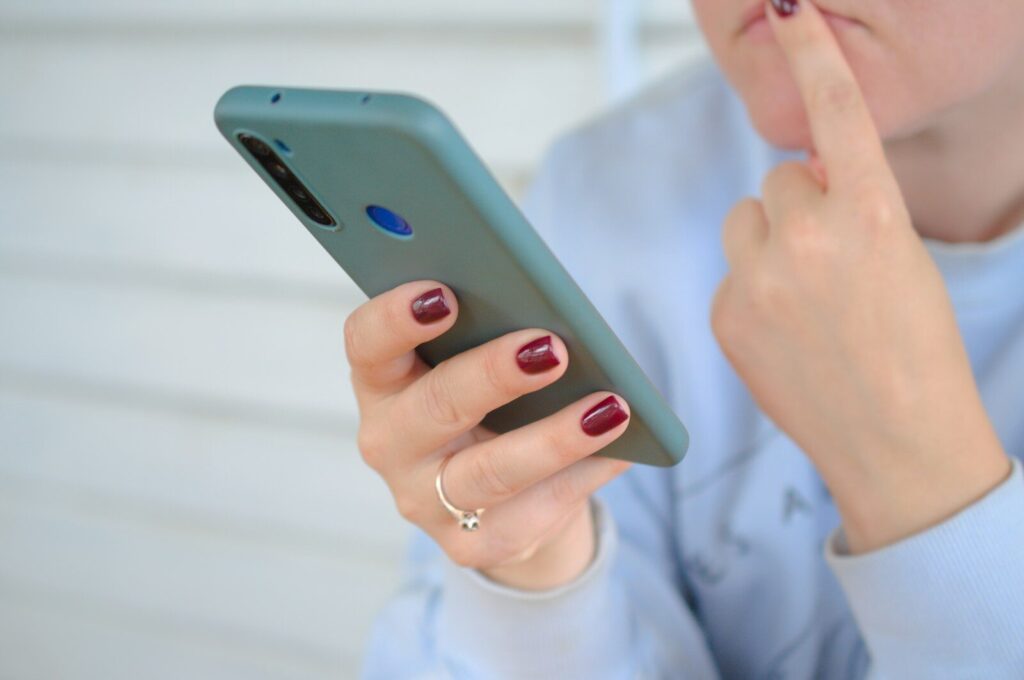 a person holding a cell phone